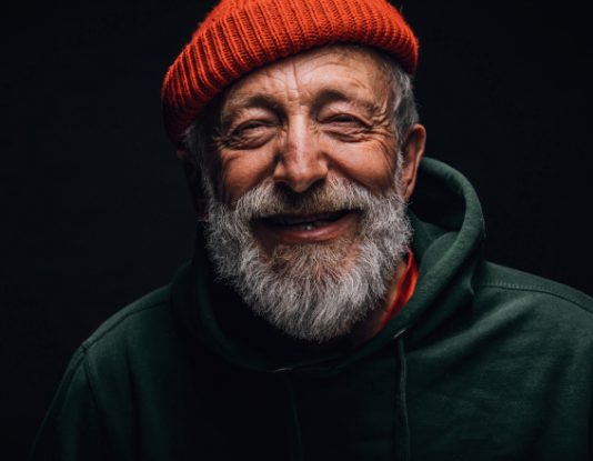 smiling homeless man